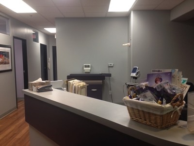 photo of the check out counter and digital infant scale can be seen.