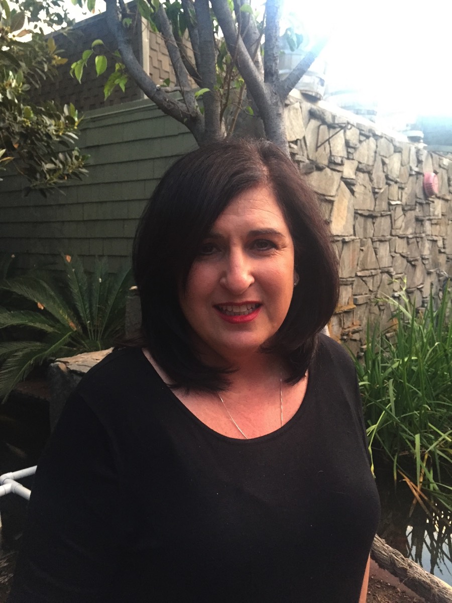 Headshot of Suzanne Mendoza